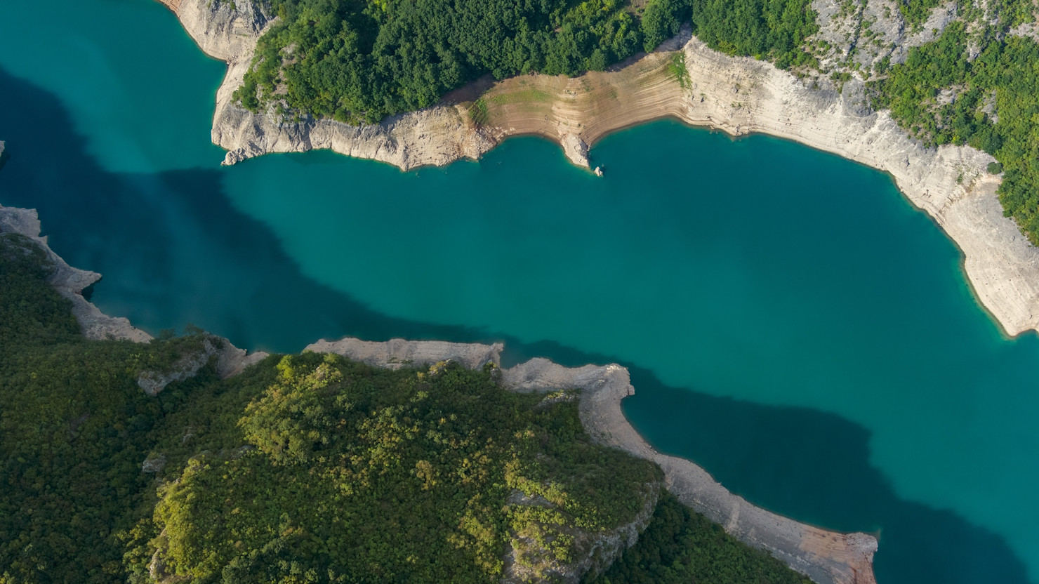 River between cliffs