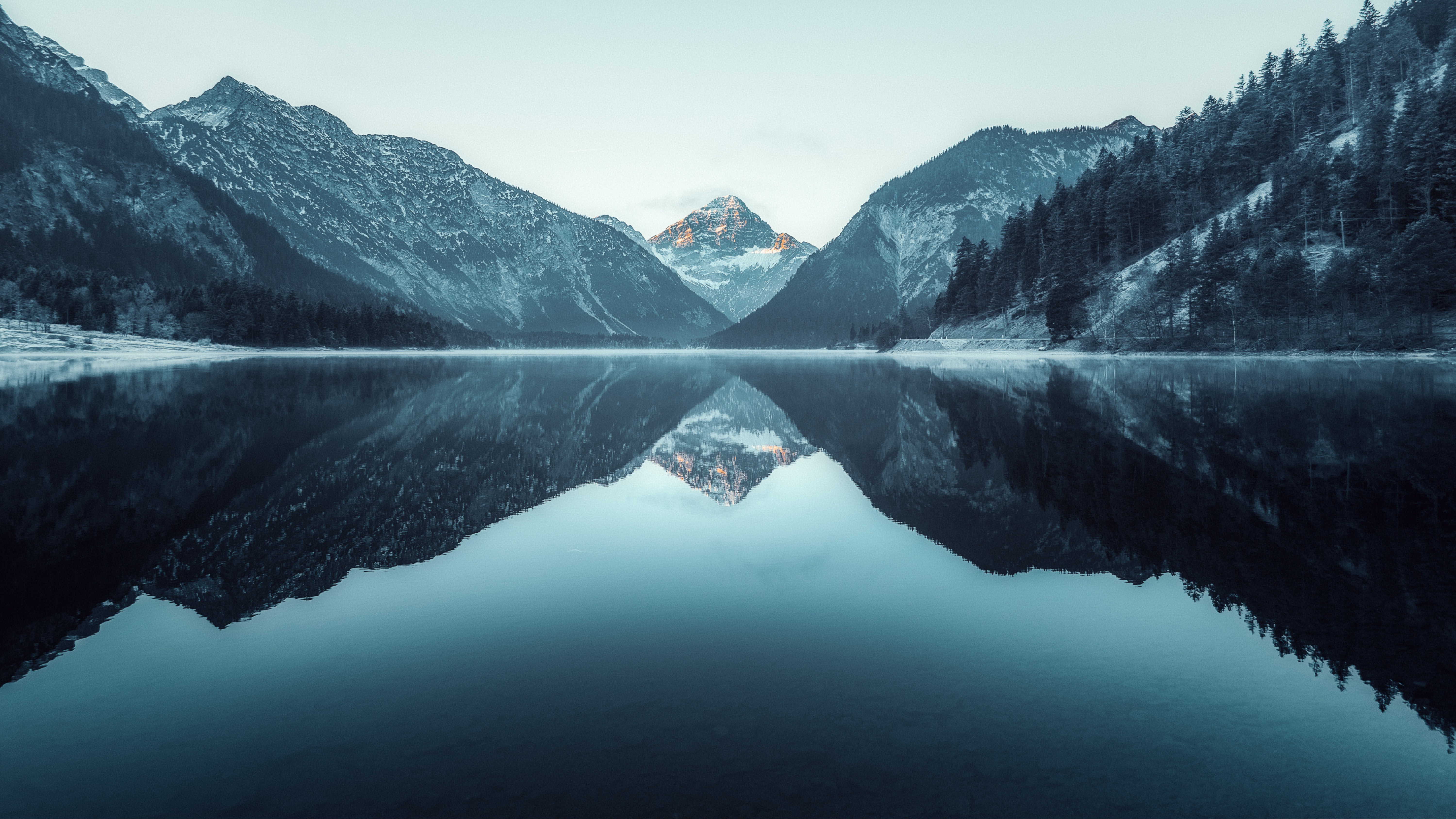 Mountain reflecting water