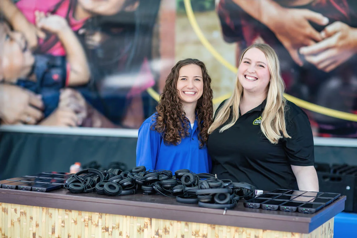 Compassion Experience volunteers welcoming guests