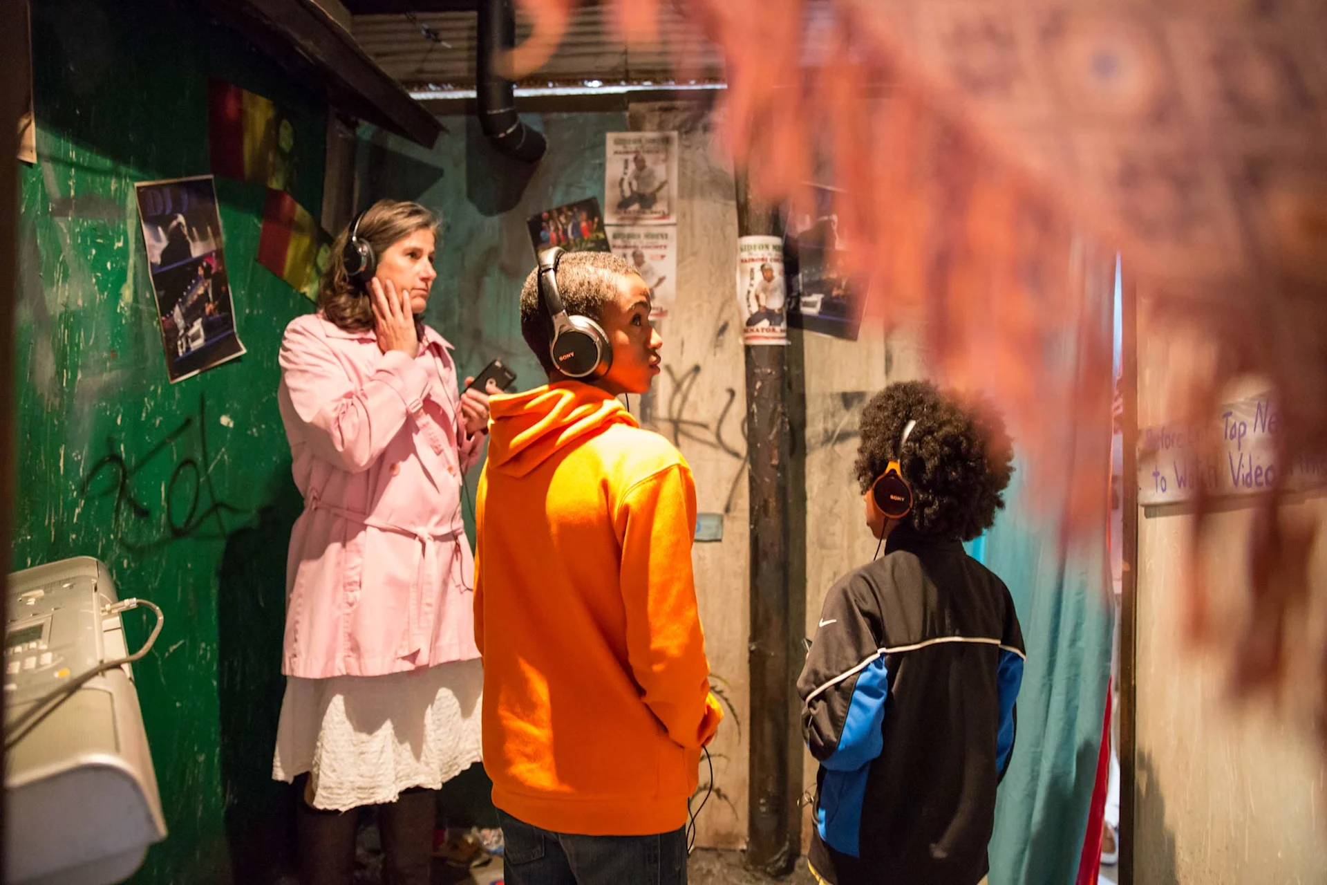 Guests listening to the Compassion Experience with headphones
