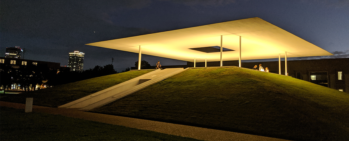 During sunset, a luminous display in the open structure complements the changing natural light. / By Rebecca Koenig