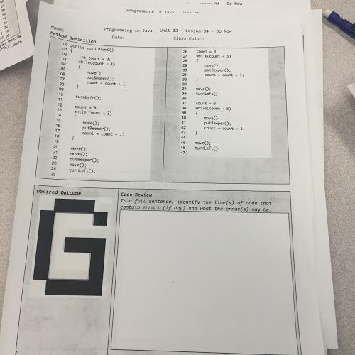 Students in Sterns' classroom work in groups of five to code anagrams. (Mary Jo Madda)