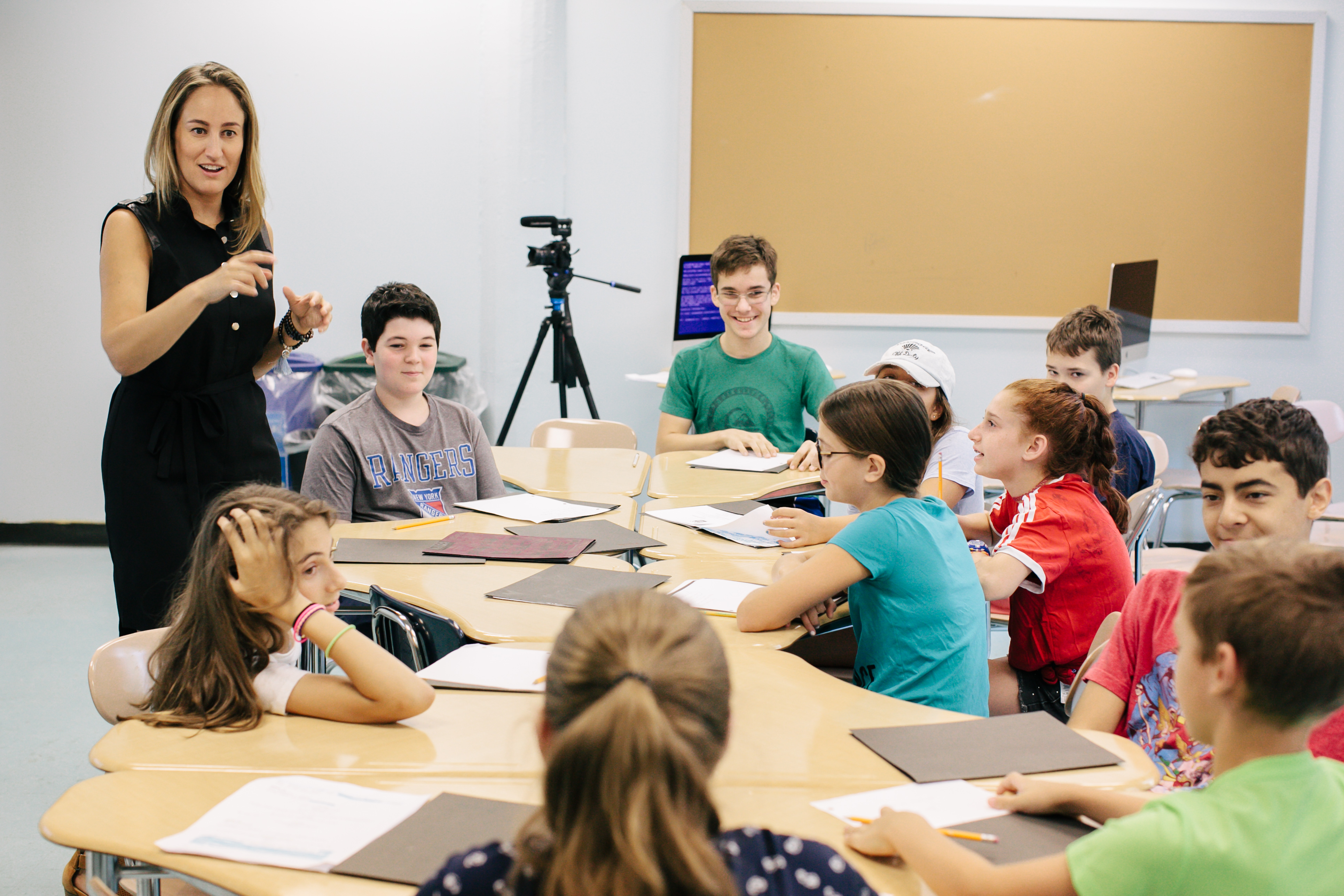 Take Two Film Academy founder, Megan Kiefer, with students at West End Secondary School in New York City. Photo: Sophie Mathewson Photography