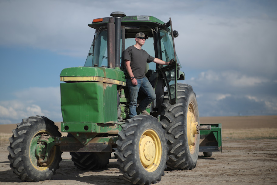 Spencer Risenmay at his family's farm in Idaho Falls, Idaho. Photo by John Roark for EdSurge.