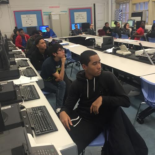 AFSE Juniors listen up, preparing for a "pair programming" assignment. (Mary Jo Madda)
