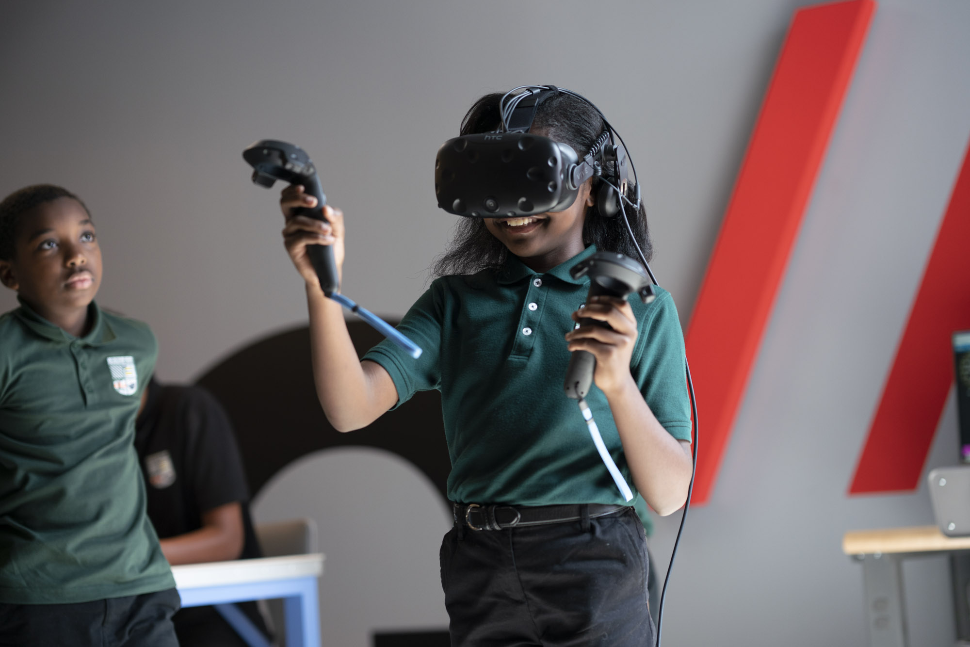A student at Entrepreneurship Prep Cliffs Campus uses the virtual reality station in her school's new 5G Learning Lab. (Verizon)
