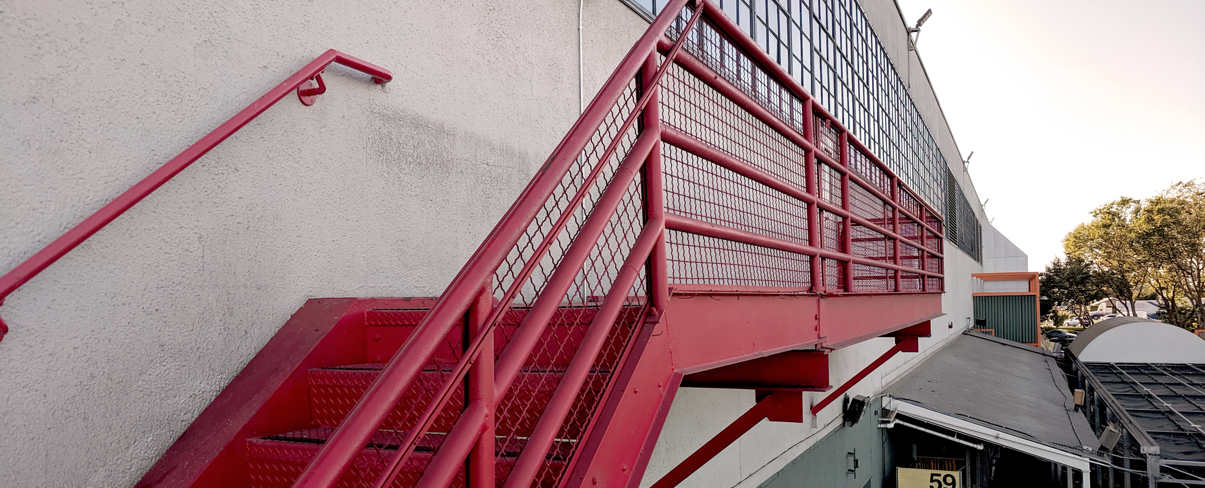The red stairway leading to Gate 510, which houses this year’s PilotCity summer fellows. (Photo Credit: Tony Wan)