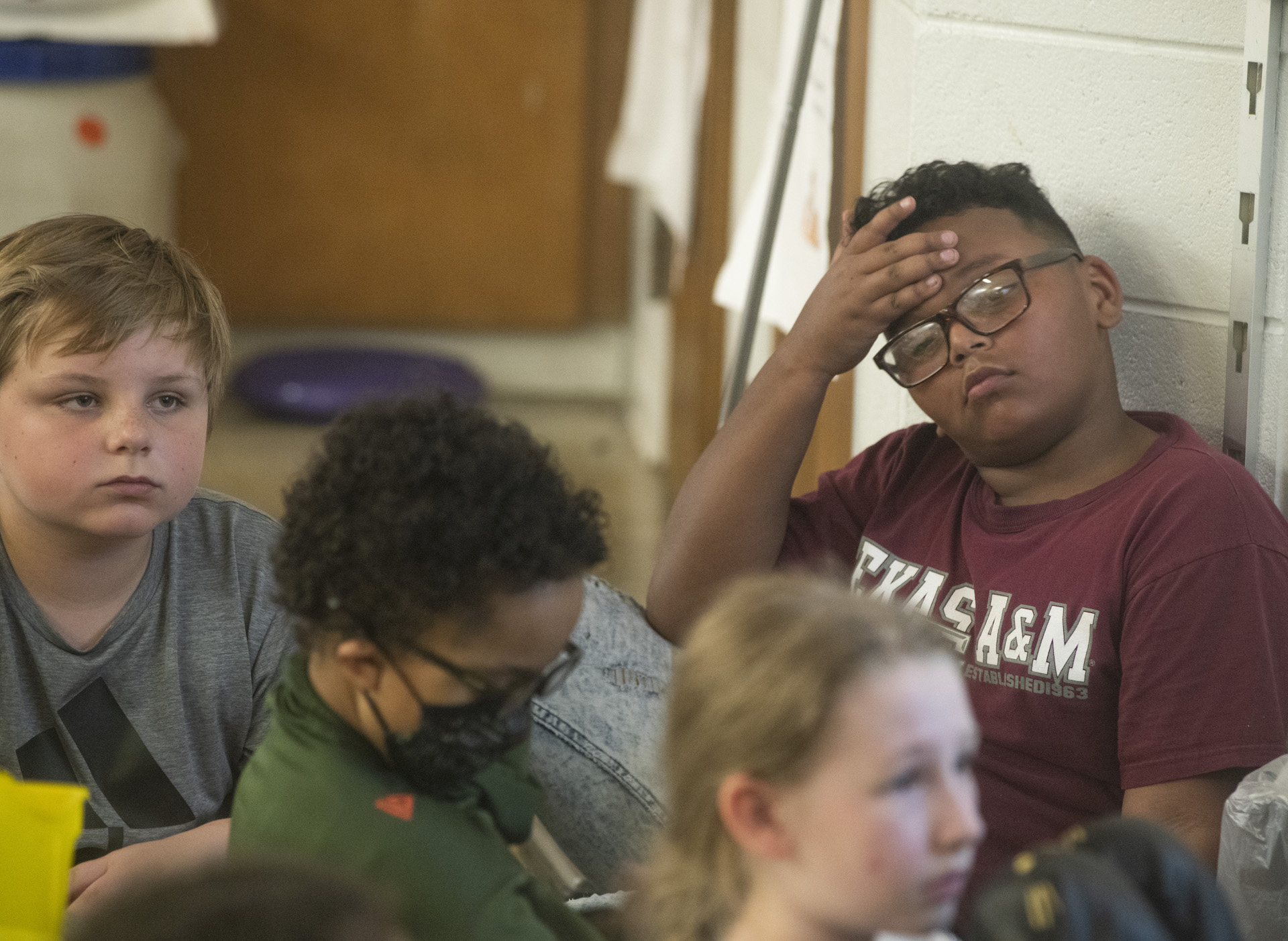 Mason Rollins, right, listens to a mindfulness lesson in his fourth grade class about reducing test-taking anxiety.