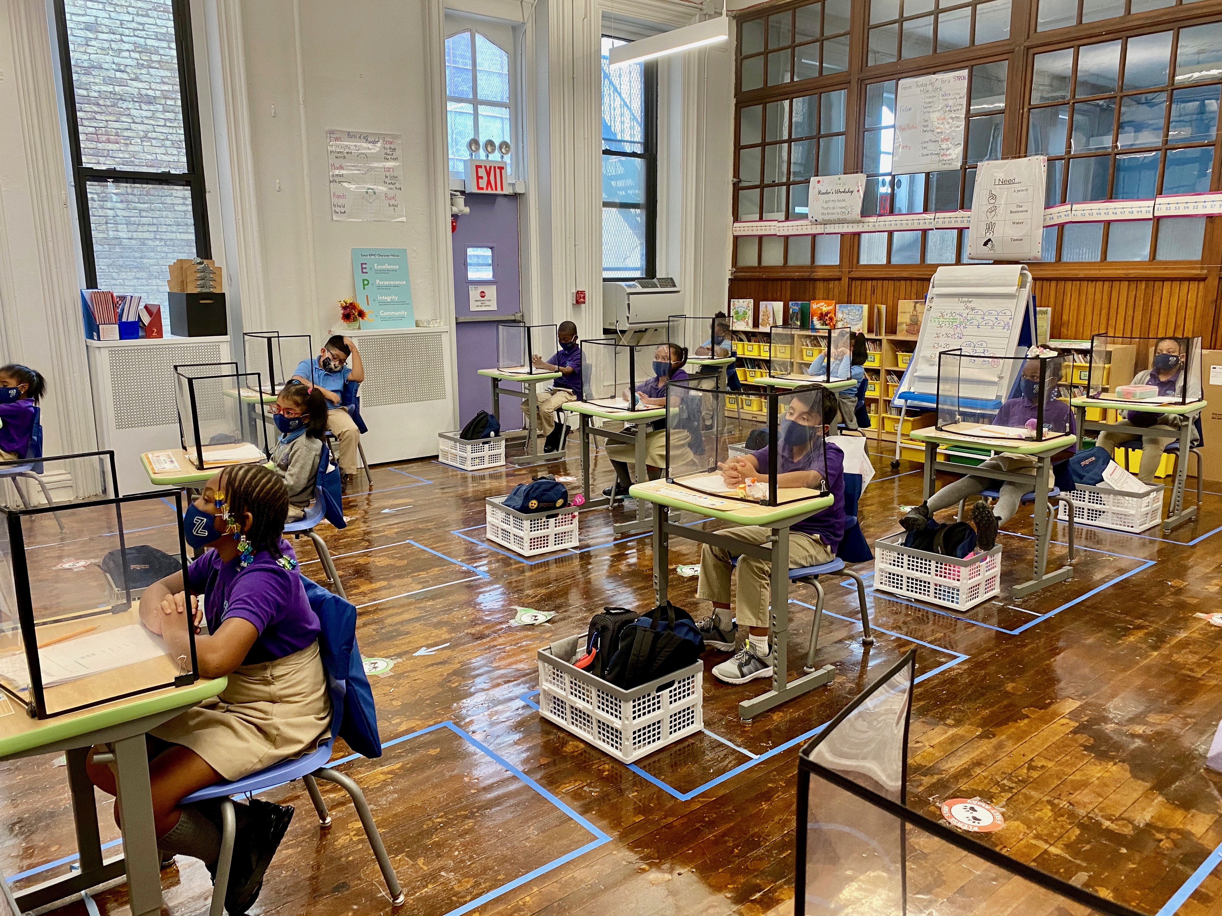 Students wearing masks in a classroom. Courtesy of Zeta Charter Schools.
