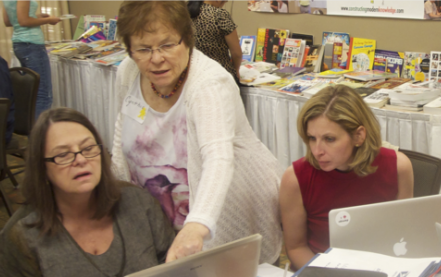 Dr. Solomon working with teachers at the Constructing Modern Knowledge summer institute