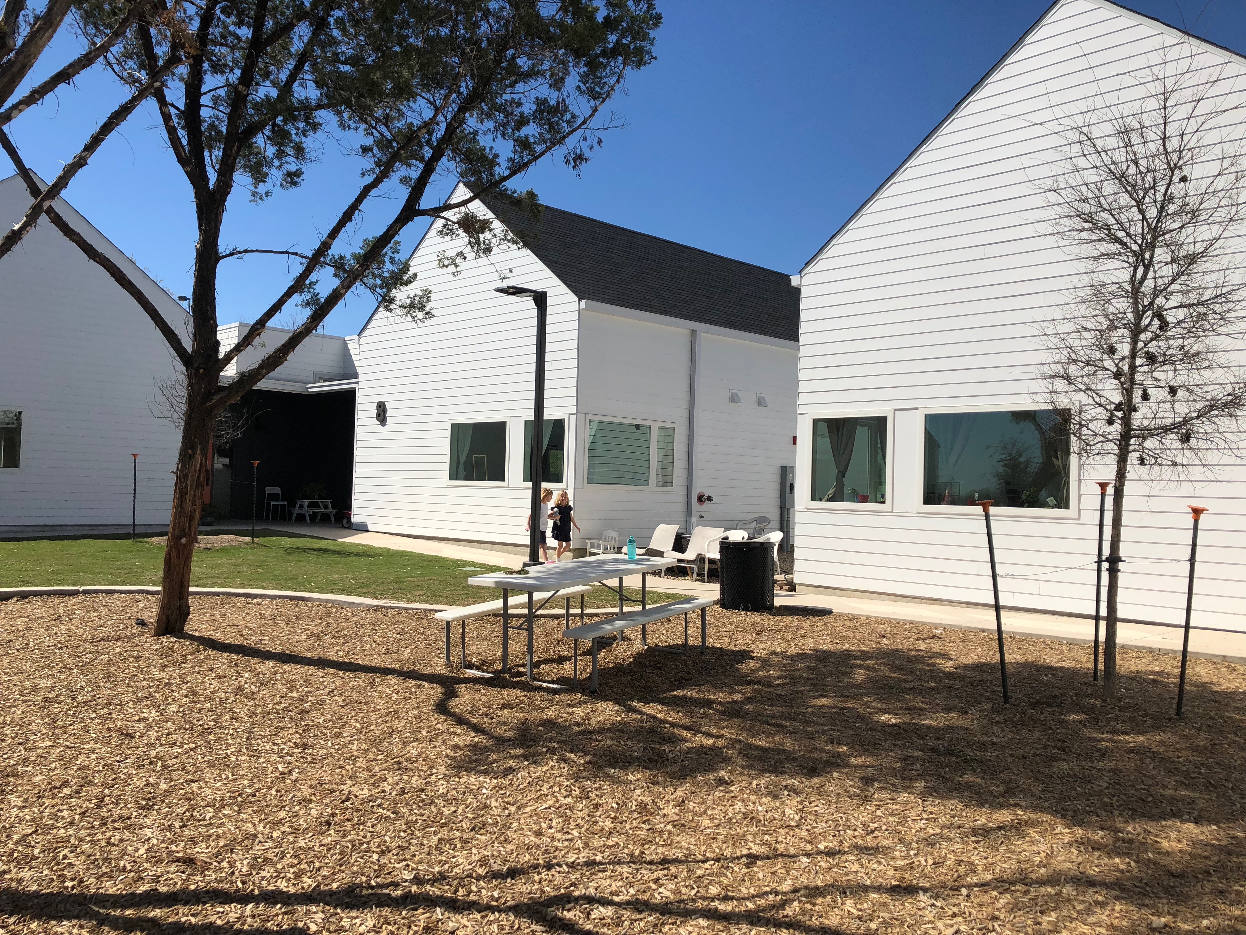 Students walking through the Magnolia Montessori For All Campus. Photo Credit: Jenny Abamu