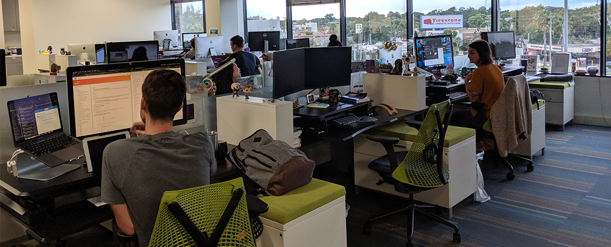 Editors, developers and scientists at work in the OpenStax office. / By Rebecca Koenig