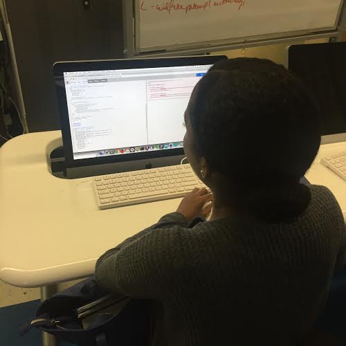 Senior Tiara Dillard, an AFSE senior from Harlem, works on a coding project. (Mary Jo Madda)