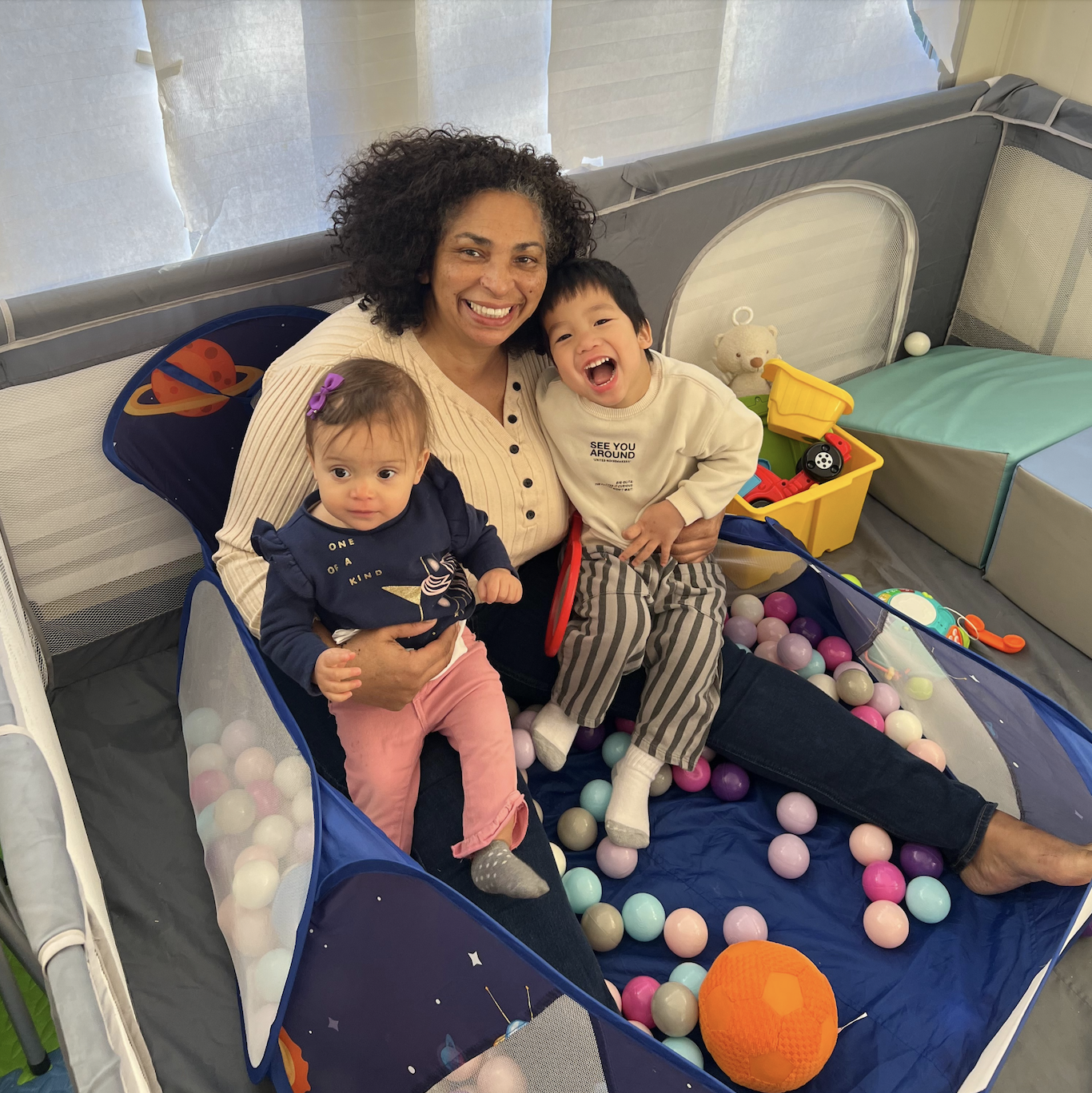Wise with two children in her home-based child care program. She describes the program she has built over the years as a “second family.” Photo courtesy of Wise.