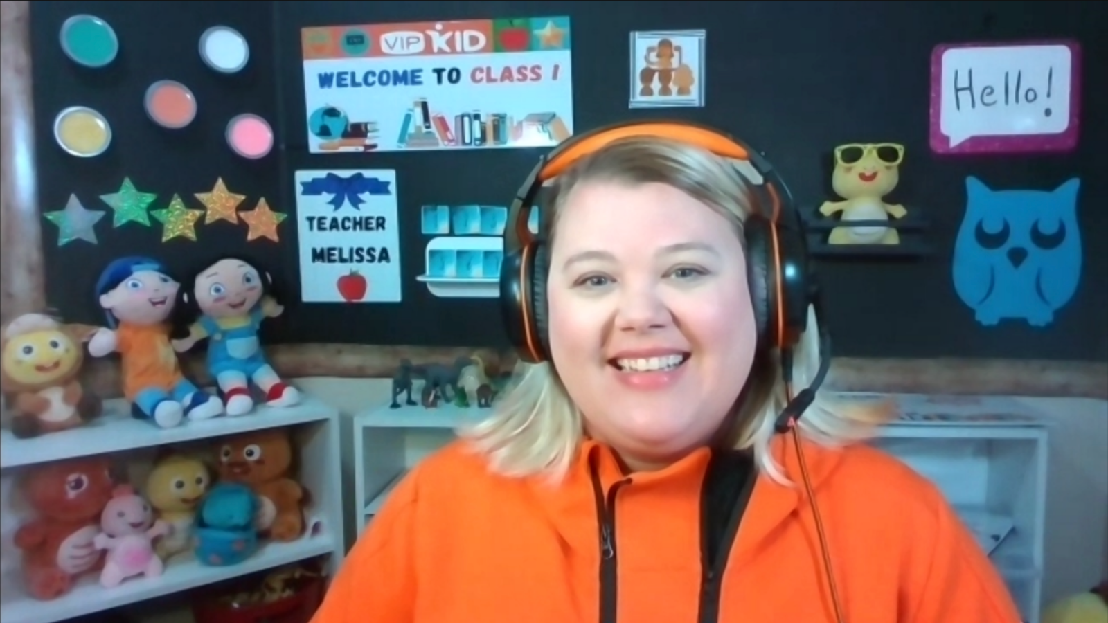 Melissa Miller plans to teach classes through VIPKid until the very end. "I bleed orange," she says while wearing a VIPKid-branded hoodie. (Screenshot)