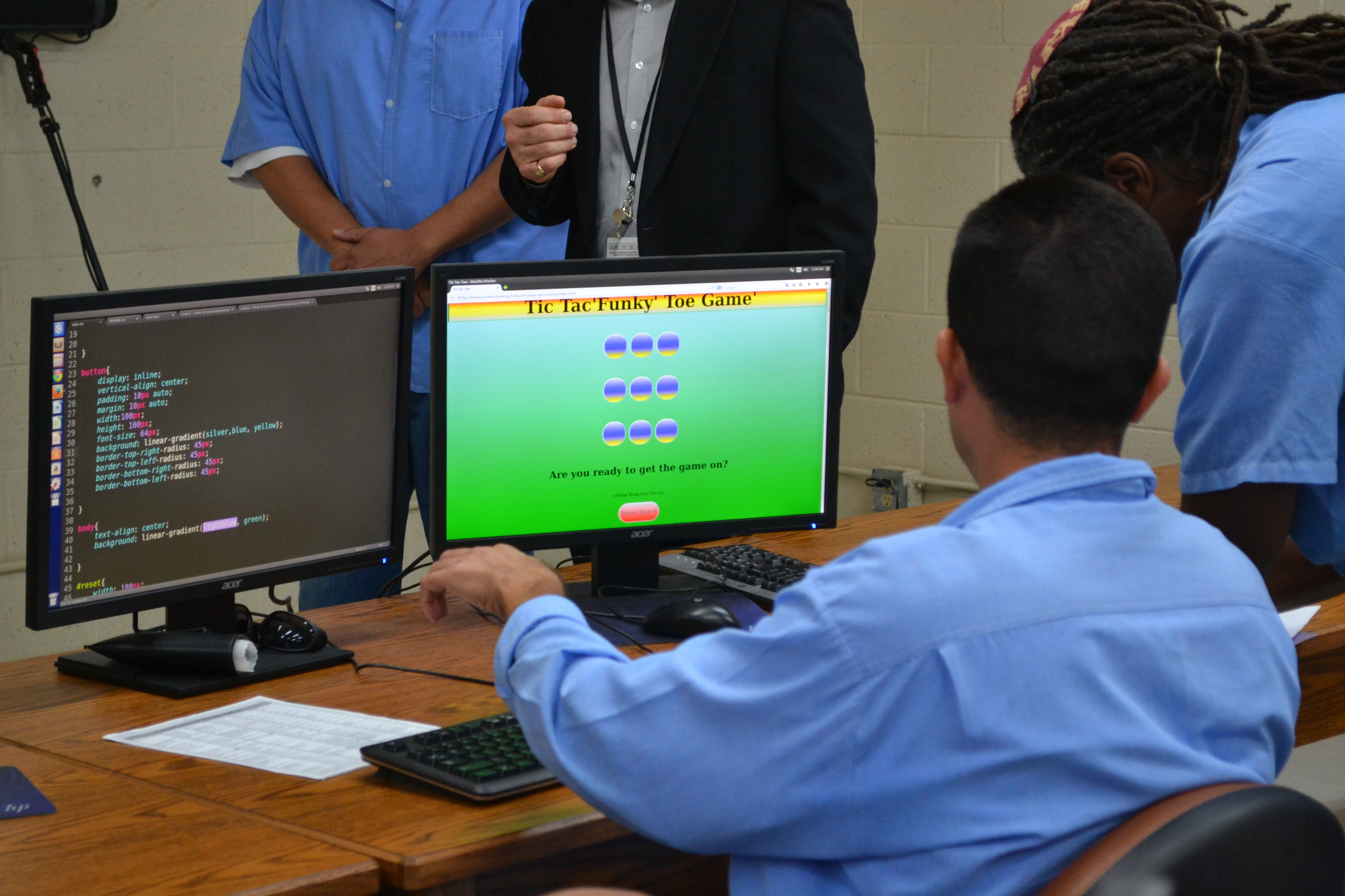Inmates work on their Tic-Tac-Toe projects.