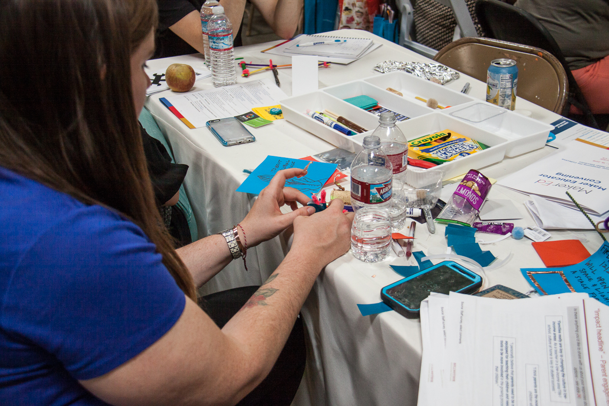 A teacher makes something at Maker Ed Convening