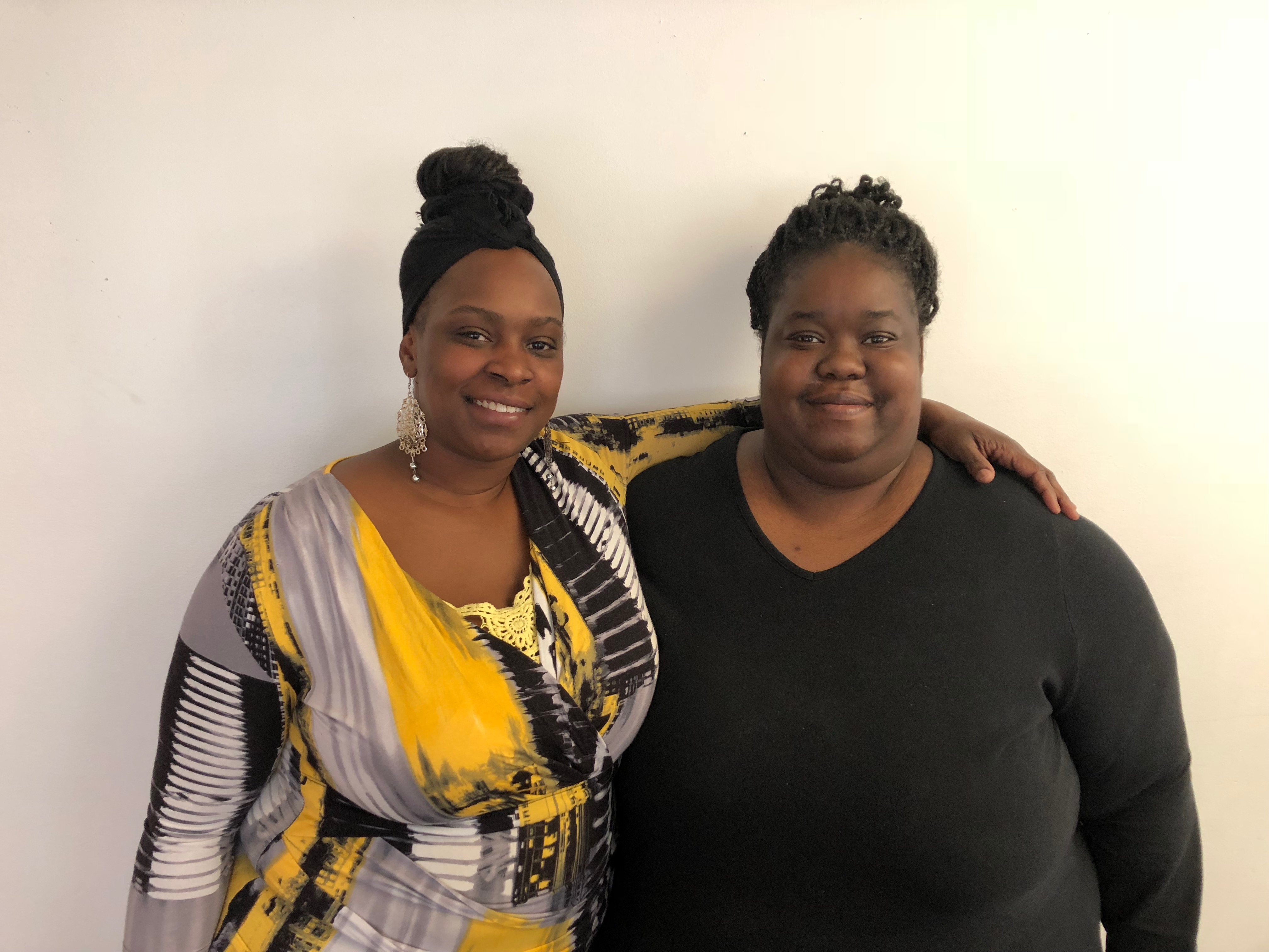 Shoniqua Kemp, left, and her friend LaTonya Peterson inside the Detroit Parent Network building. Photo Credit: Jenny Abamu