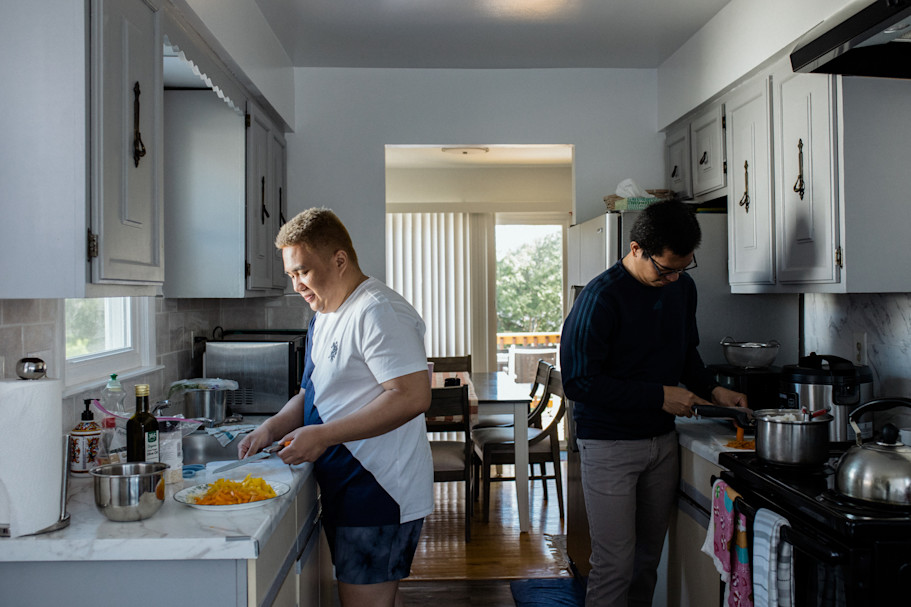 Cruz and Sagun prepare food together at home.
