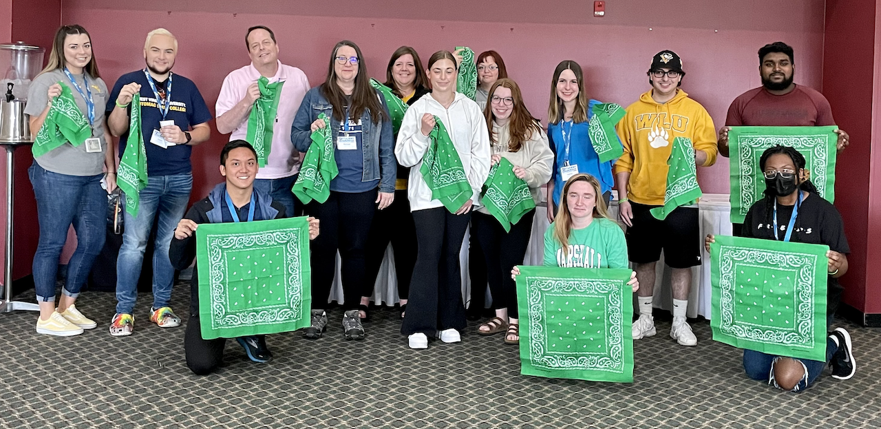 Student-government leaders and advisers received green bandanas after completing mental health peer-support training in 2022. Photo courtesy of WVHEPC.