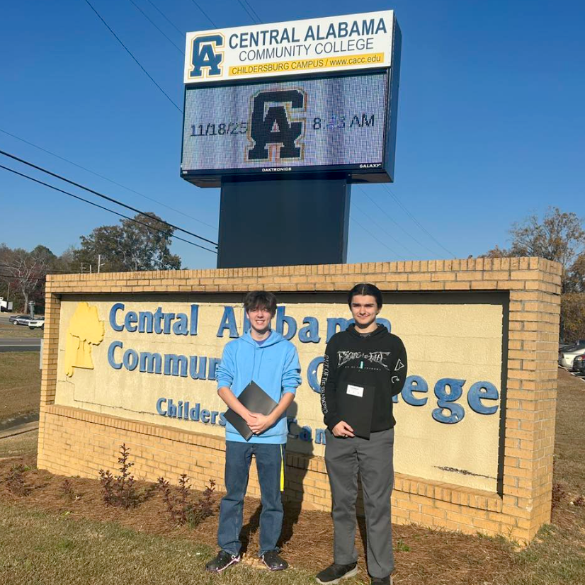 Gavin (right), a junior at Childersburg High School, poses with a classmate after passing the Tech+ certification exam at Central Alabama Community College.