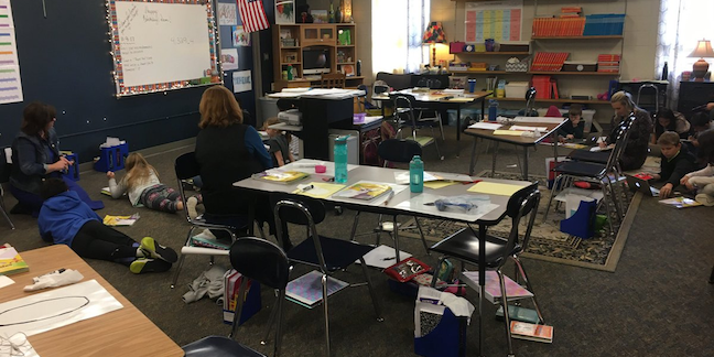 District-level leaders engaging with learners at Millard Public Schools, Image Credit: Ryan Saunders
