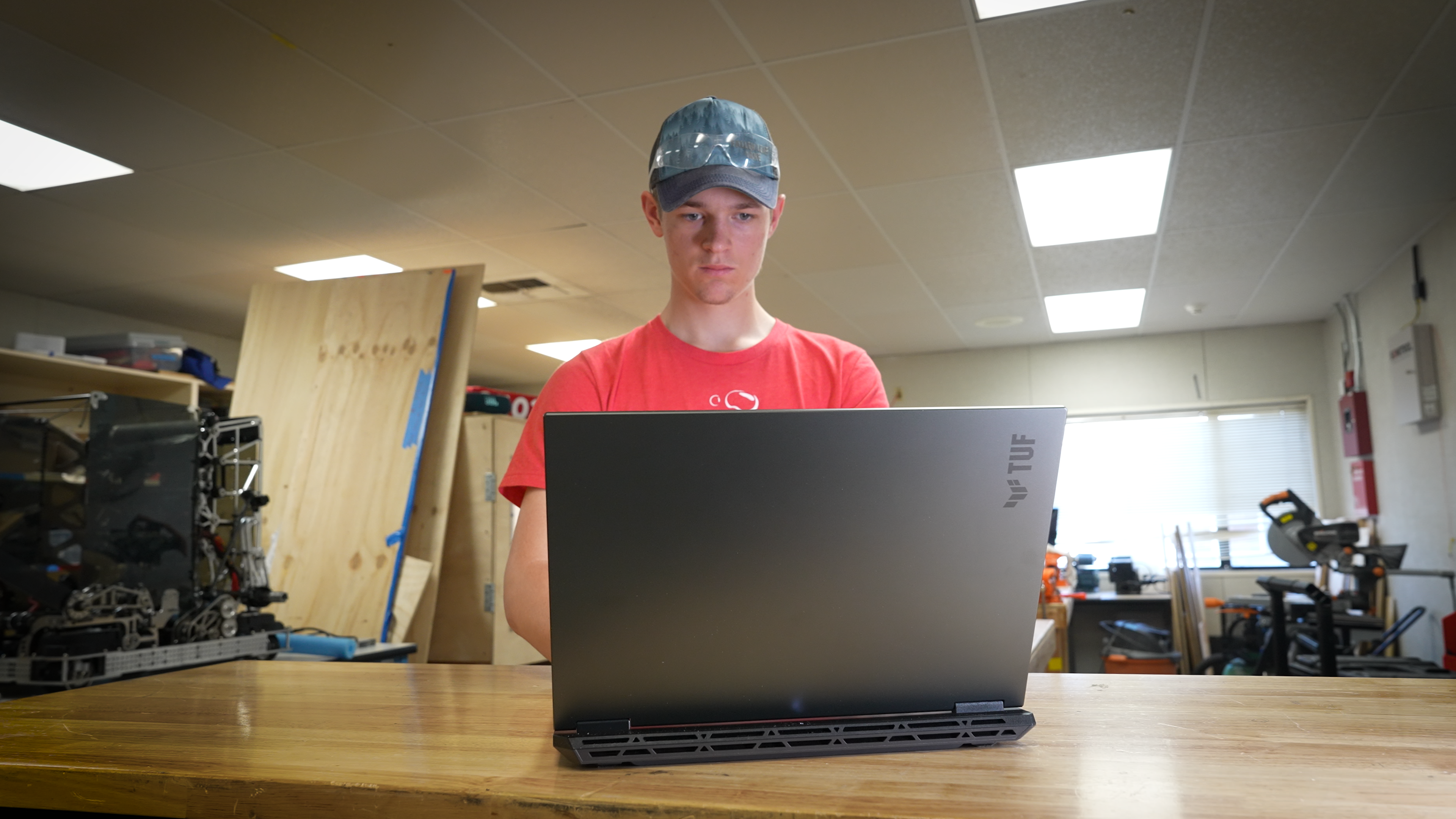 A STEM Student Works on a Laptop