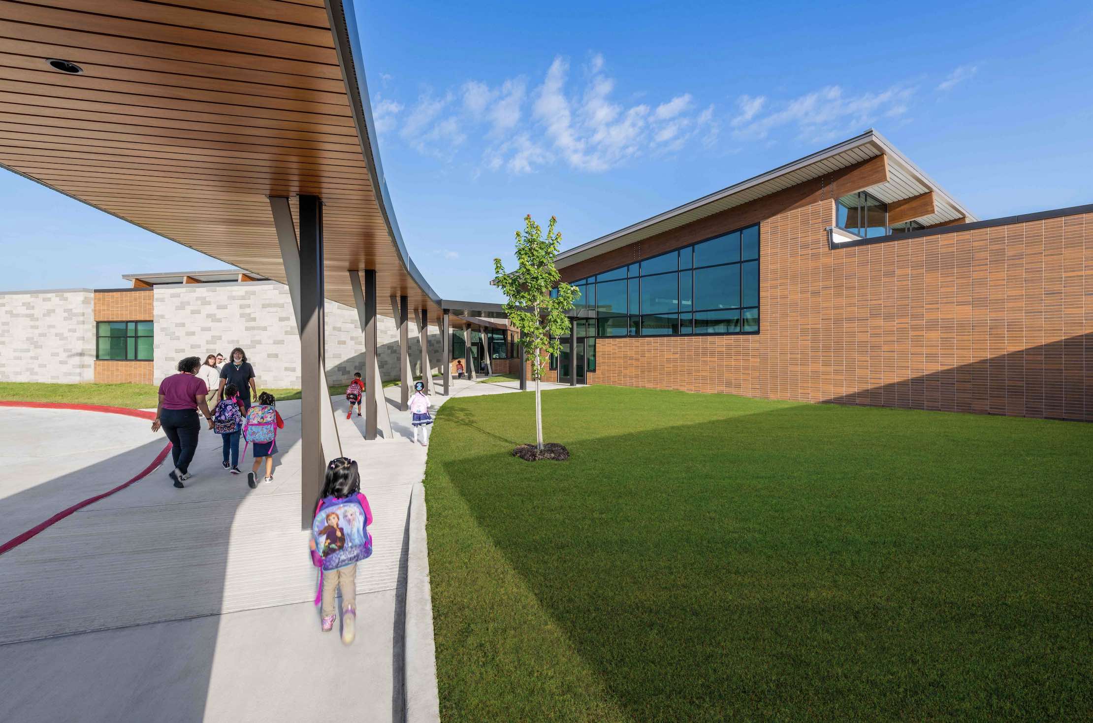 The Jefferson Early Learning Center in Houston was designed with covered walkways throughout campus to protect students, faculty and visitors from the heat. Photo courtesy of PBK.