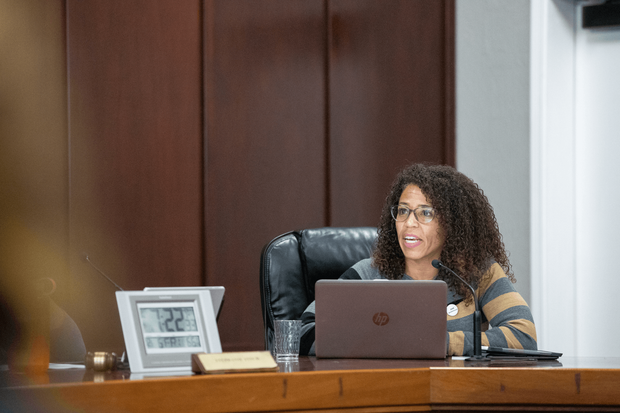 Ravenswood school district interim Superintendent Gina Sudaria delivers a presentation on which district schools may merge at a school board meeting in East Palo Alto on Dec. 6, 2019. Photo by Magali Gauthier for The Almanac.