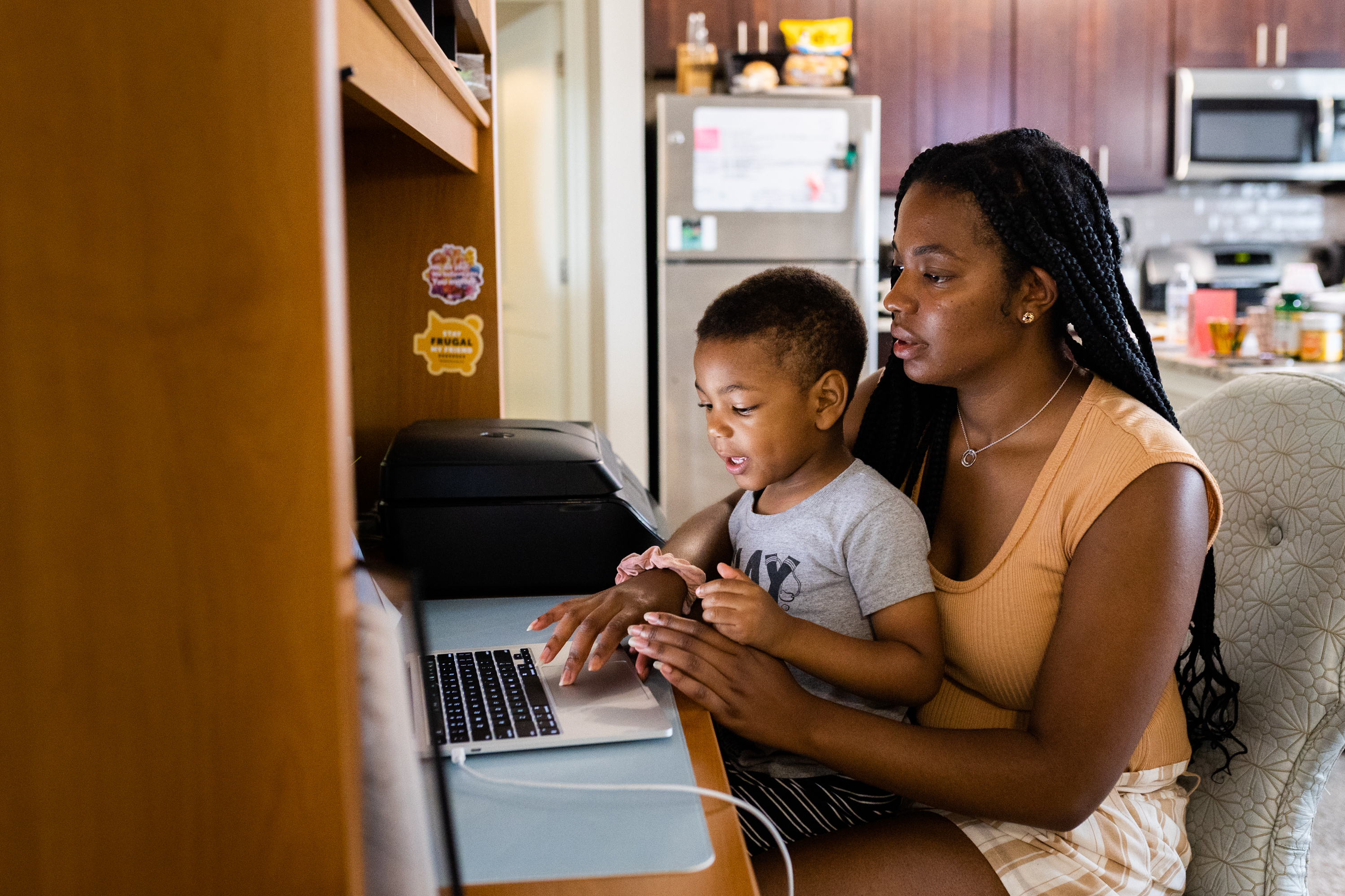 Sarah Turner spends time with her son Noah at home, on Sunday, July 3, 2022. Photo by Rosem Morton for EdSurge.