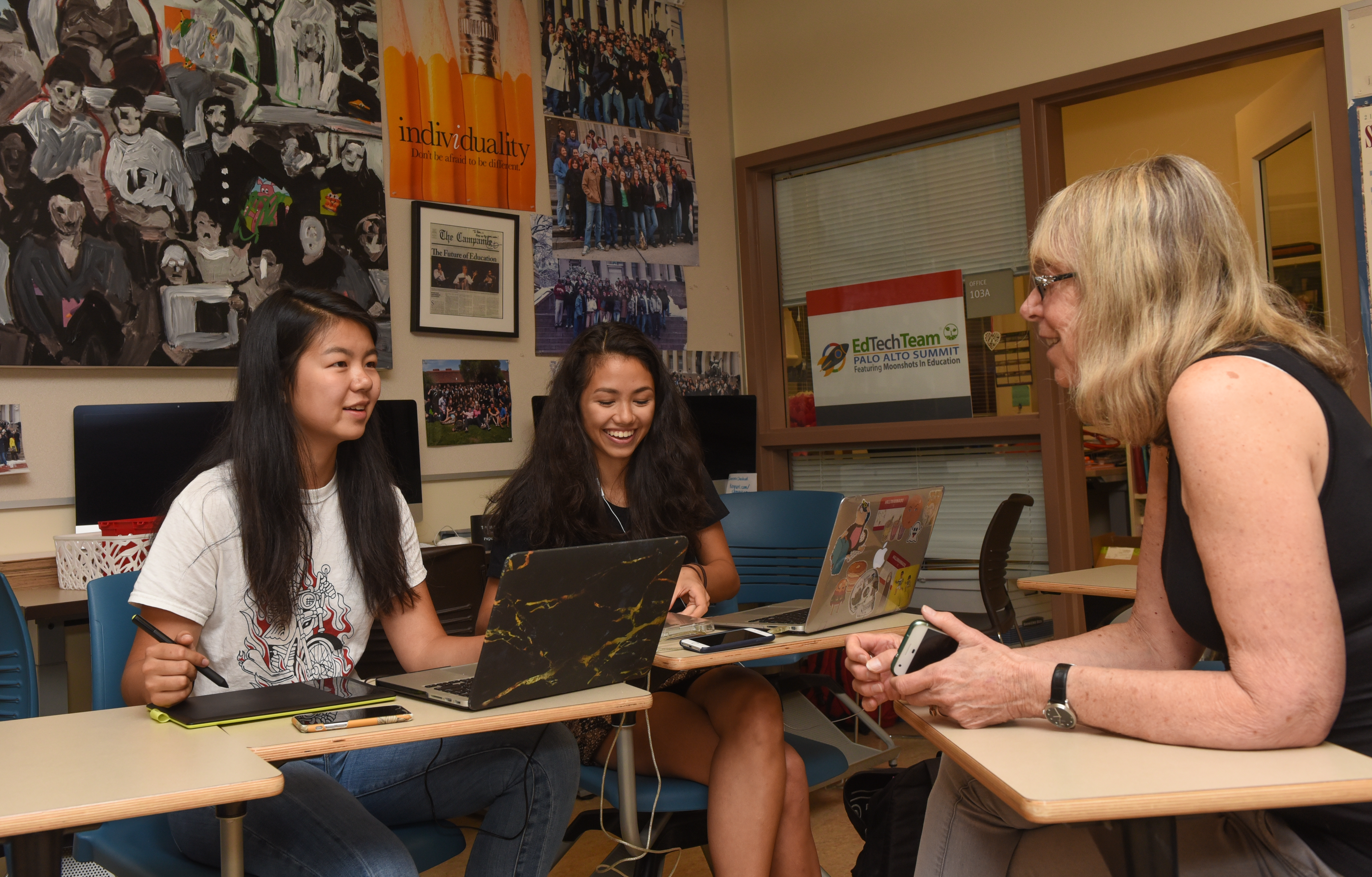 Esther Wojcicki working with students