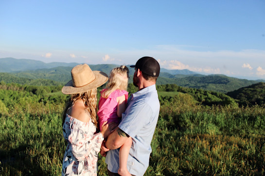Dollywood "host" Katy Maples-Posey, left, with her daughter and husband. Maples-Posey takes advantage of her employer's child care benefits. Photo courtesy of the Dollywood Company.