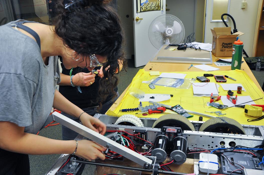 Students at St. Mary's Academy building robots