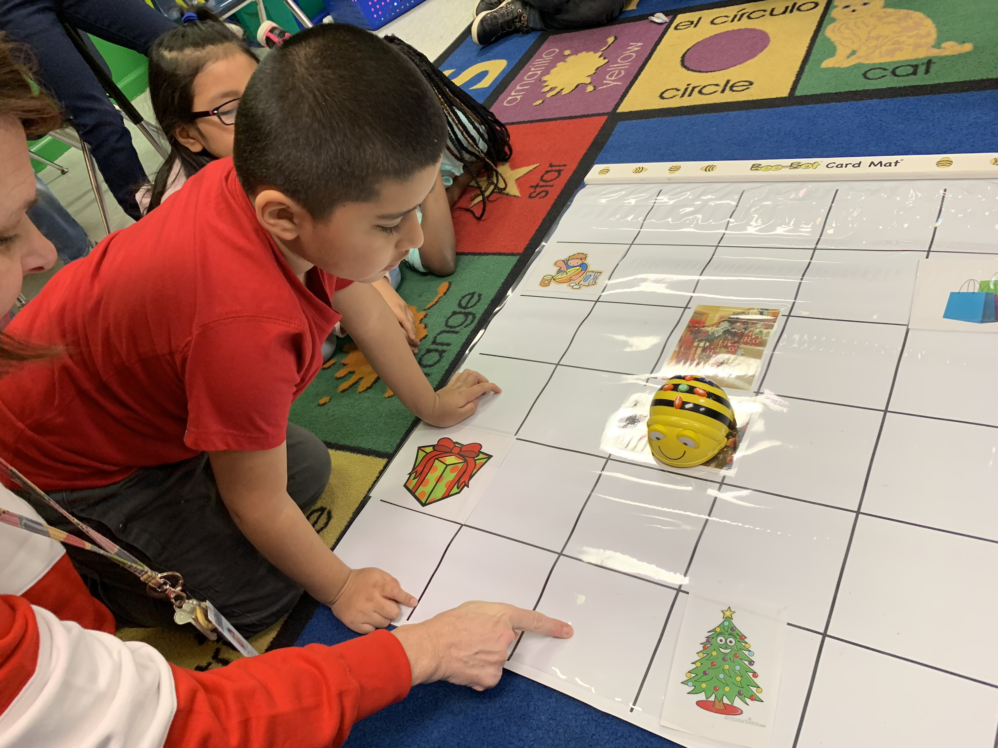 Students using Bee-Bots, Image Credit: Faith Plunkett