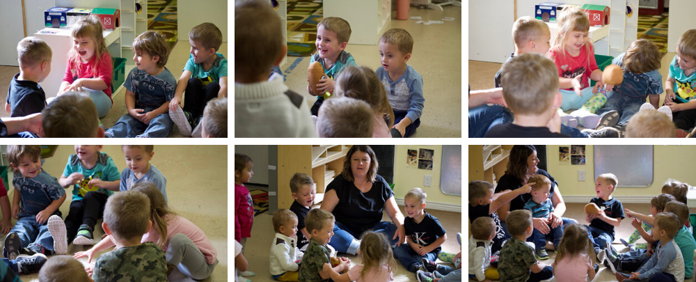 While Shotwell changes diapers across the room, Derbidge plays hot potato with the children to signal the transition between snack time and outside play. (Emily Tate / EdSurge)