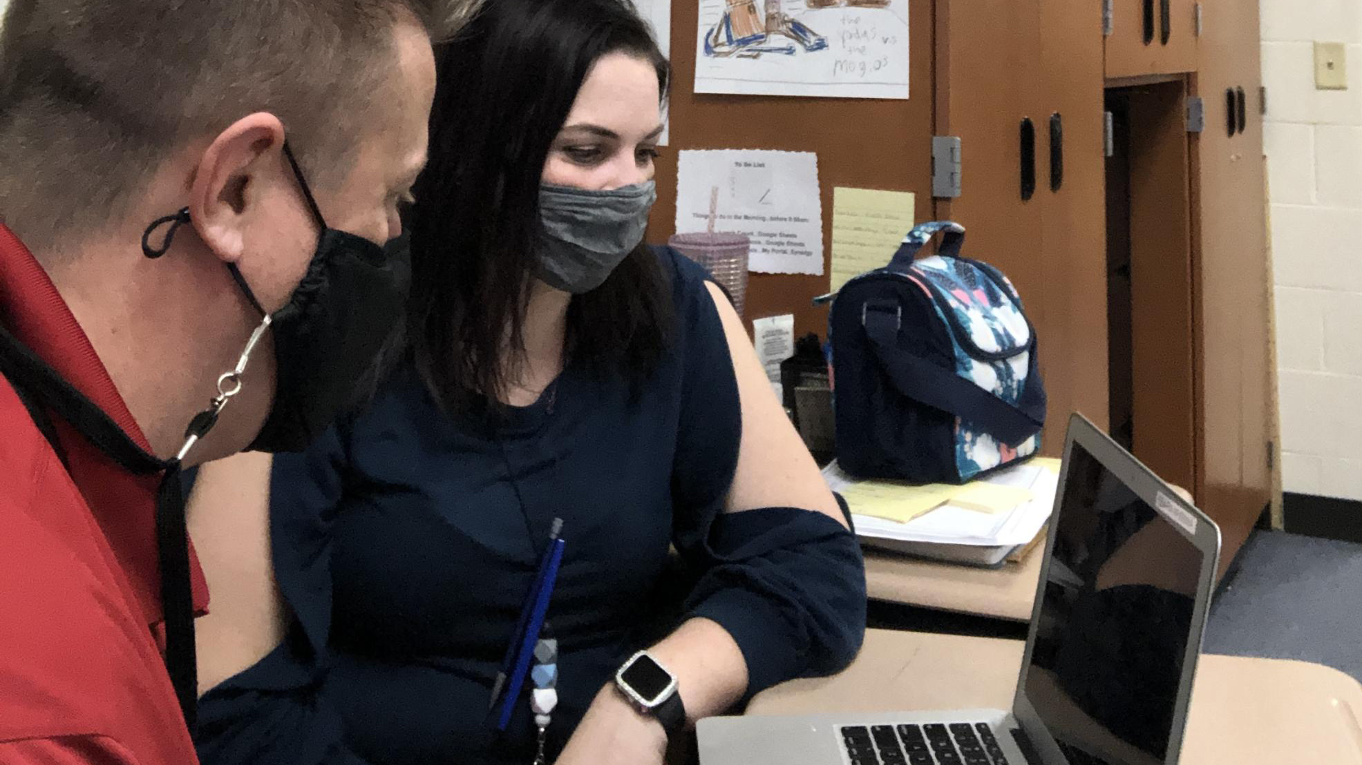 Tonja and I planning what co-teaching strategy to use for our class. (Photo credit: Tom Whissinand)