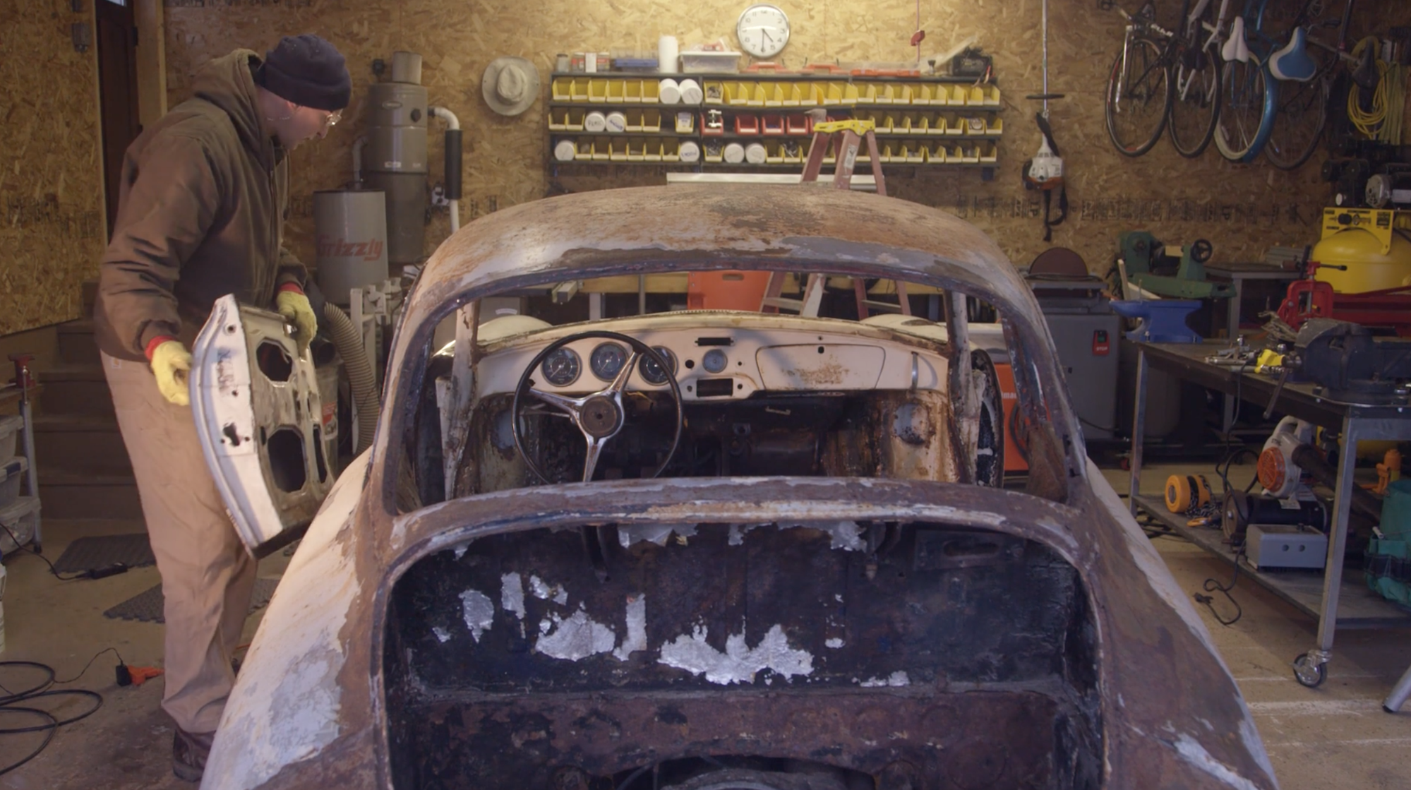 John Branch restoring a 1963 Porsche 356. Source: Course Hero.