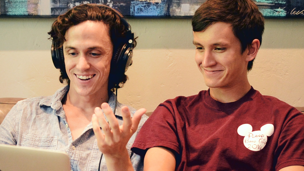 Taylor Haun (left) with a student