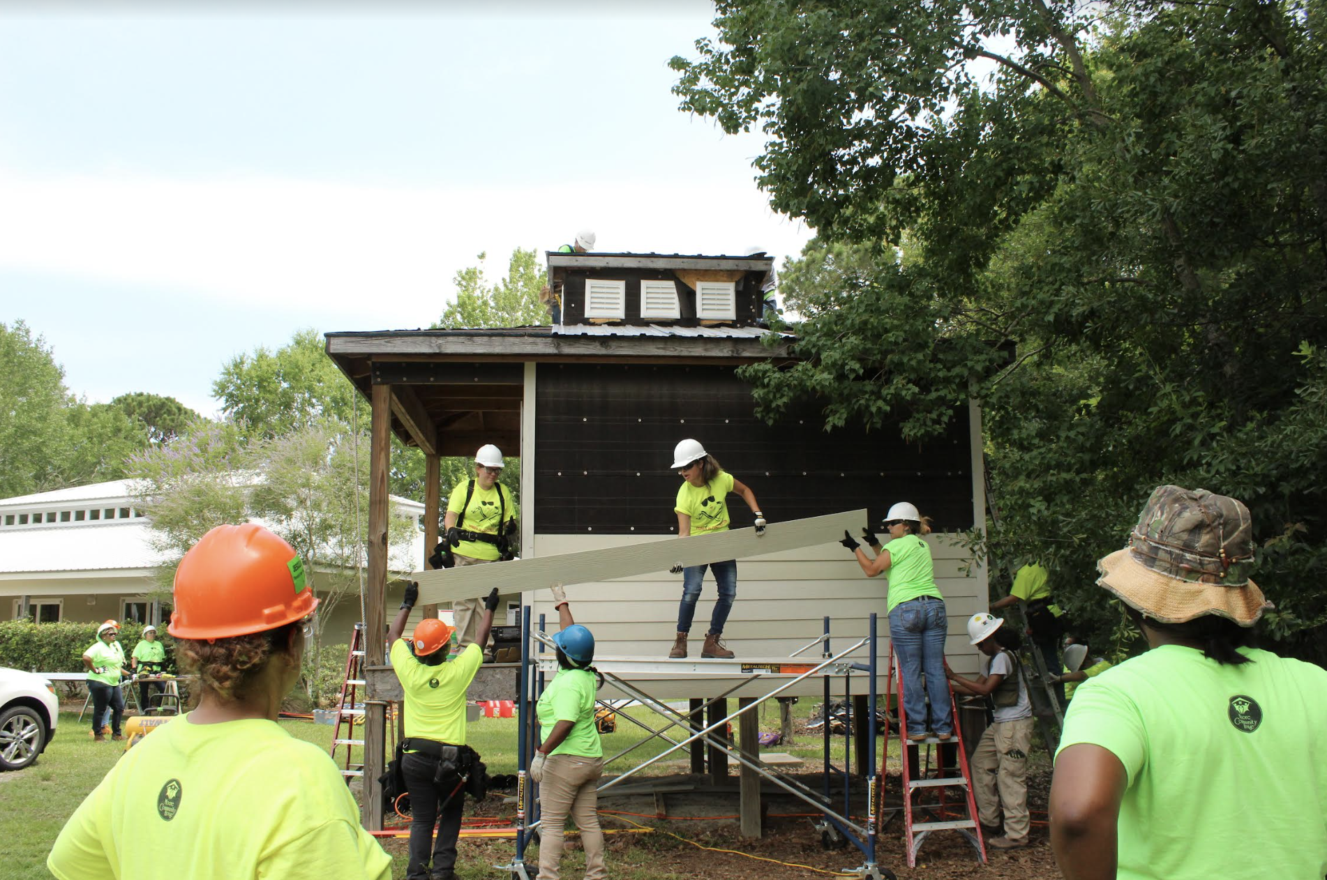 The program includes hands-on training. Photo courtesy of Moore Community House.