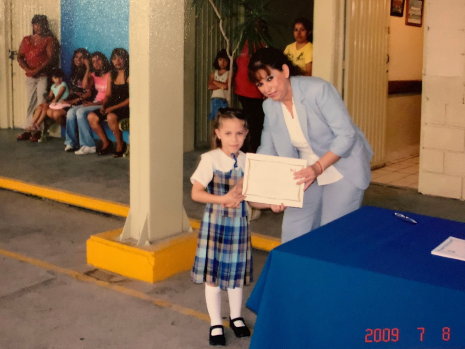 Viridiana Martinez with her first grade teacher in Monterrey, Mexico. (Photo courtesy of Martinez)