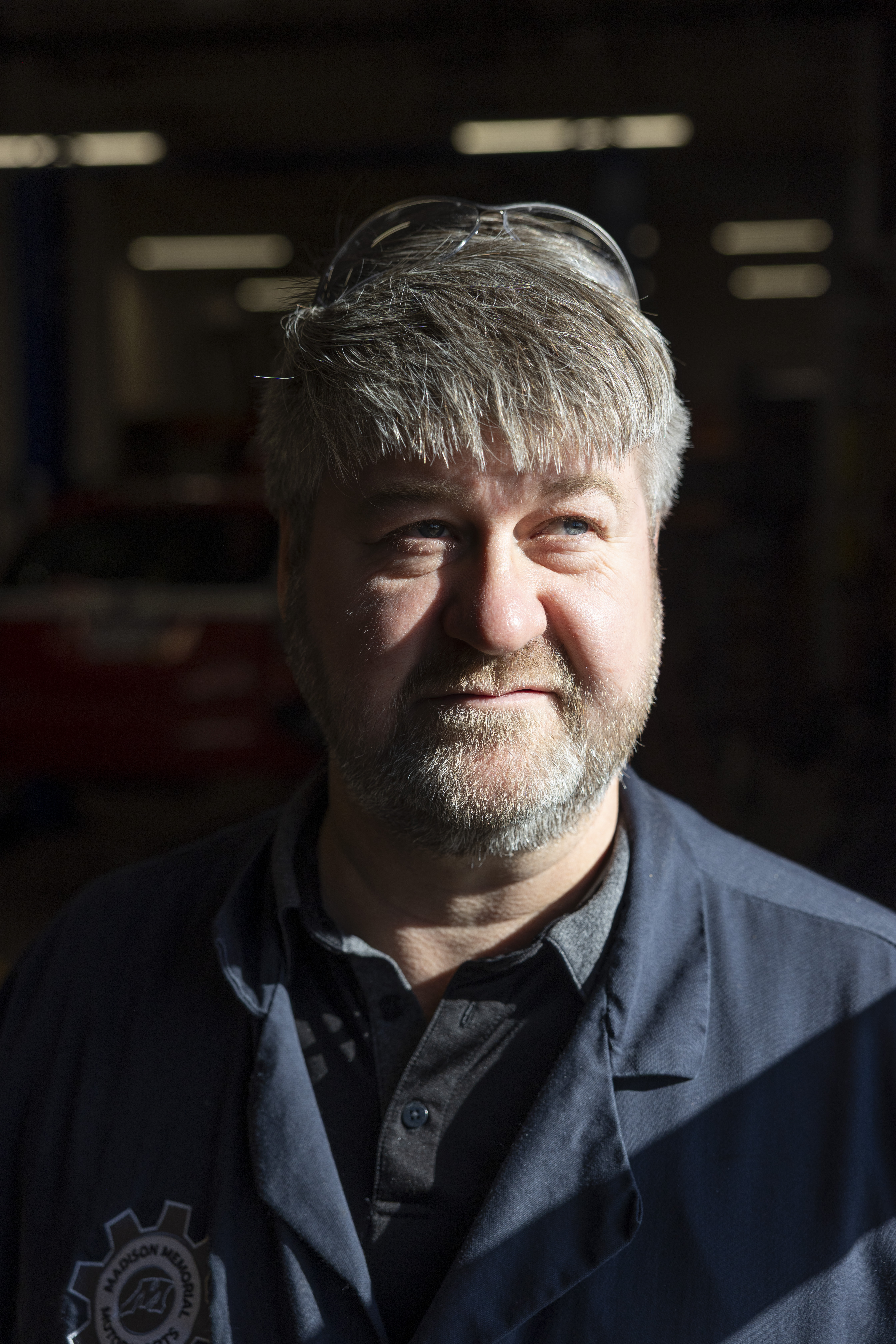 High school teacher Miles Tokheim earns an extra $50 a year teaching a college course. (Photo by Joe Timmerman, Wisconsin Watch)