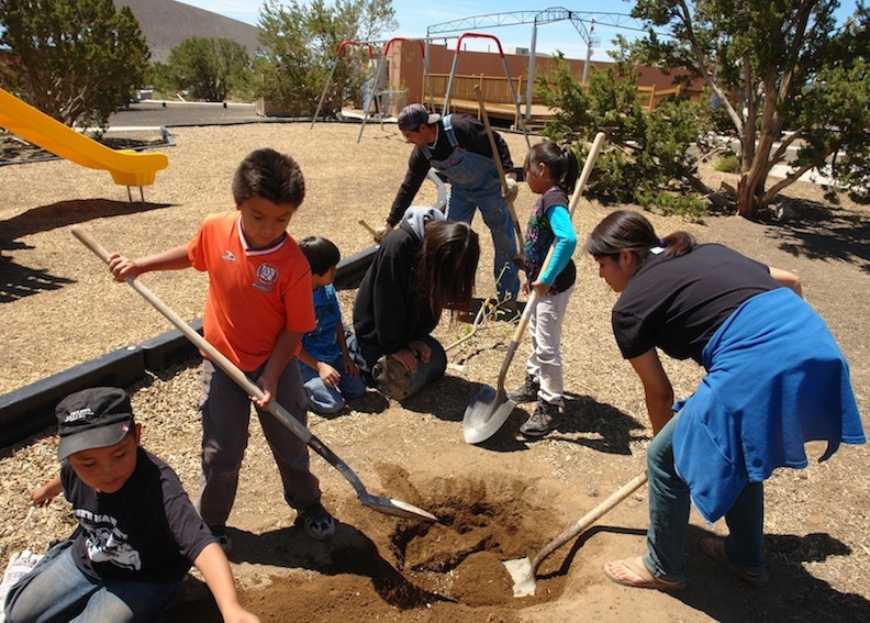STAR students planting native trees in the community