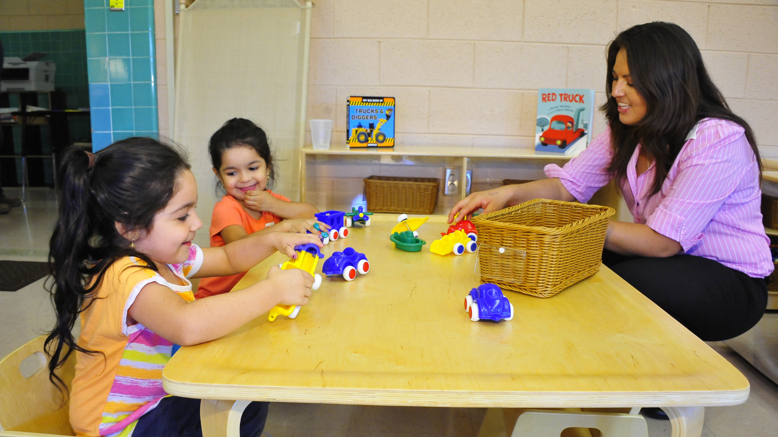 At the Brichta Infant and Early Learning Center in Tucson Unified School District, teachers use play to introduce concepts such as cooperation, sharing and self-expression. Photo courtesy of Tucson Unified.