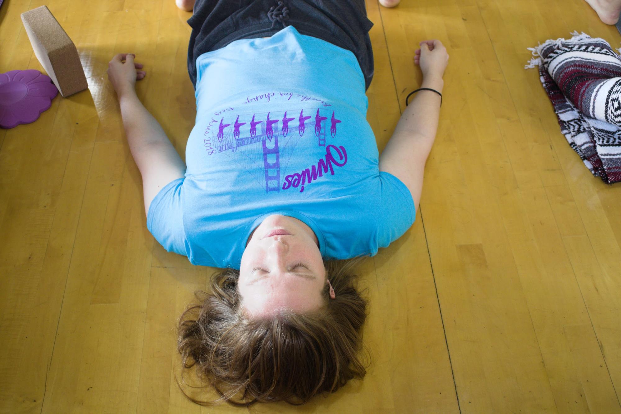 Breathe For Change student Kimberley Rose in a yoga session. Photo Credit: Tina Nazerian