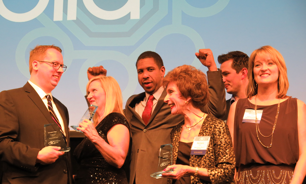 Dr. Oluseyi (center, with arms raised) with several DILA winners