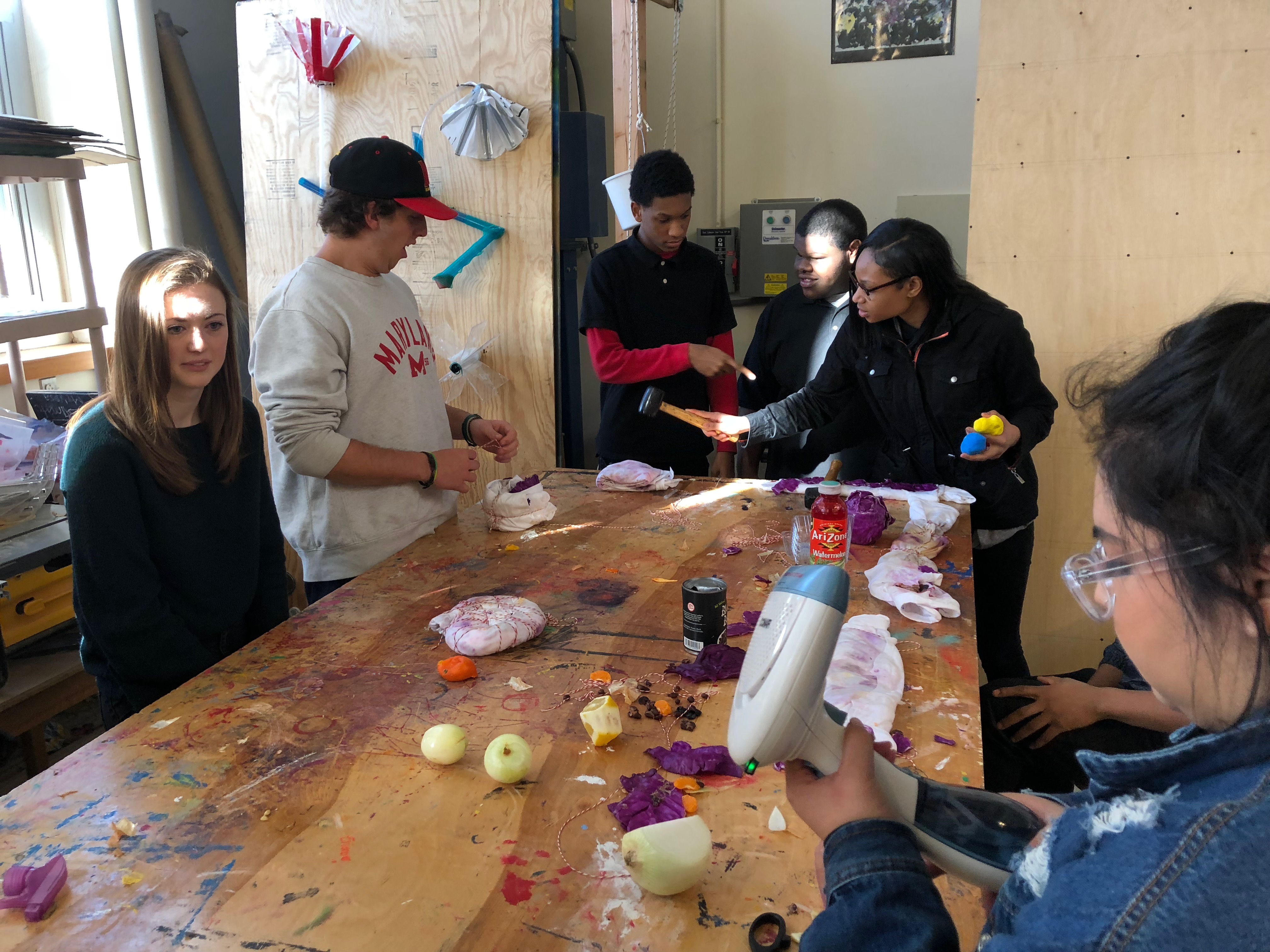 College and high school students in Detroit working on a woodshop project. Photo Credit: Jenny Abamu