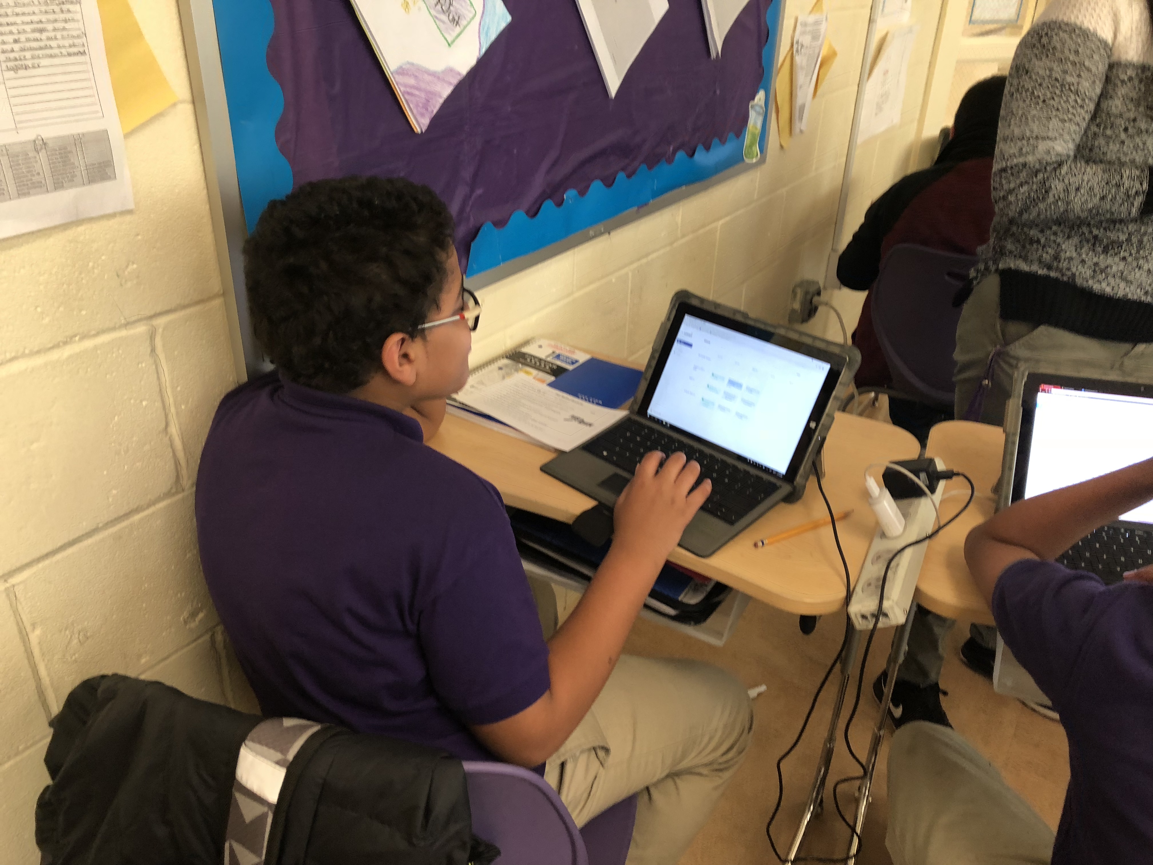 Sixth-grader, Chris Pozo, using the Summit Platform in is science class. Photo Credit: Jenny Abamu