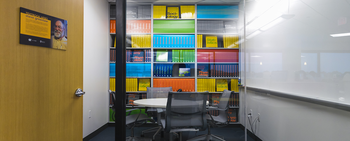 OpenStax textbooks are display in a room named for the author of one the nonprofit's economics books. / By Jemel Agulto, OpenStax