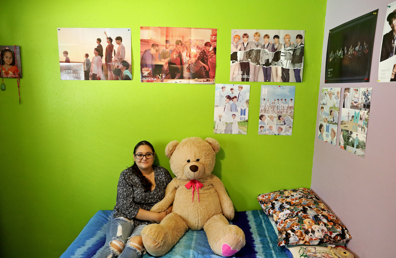 Maytee with a teddy bear