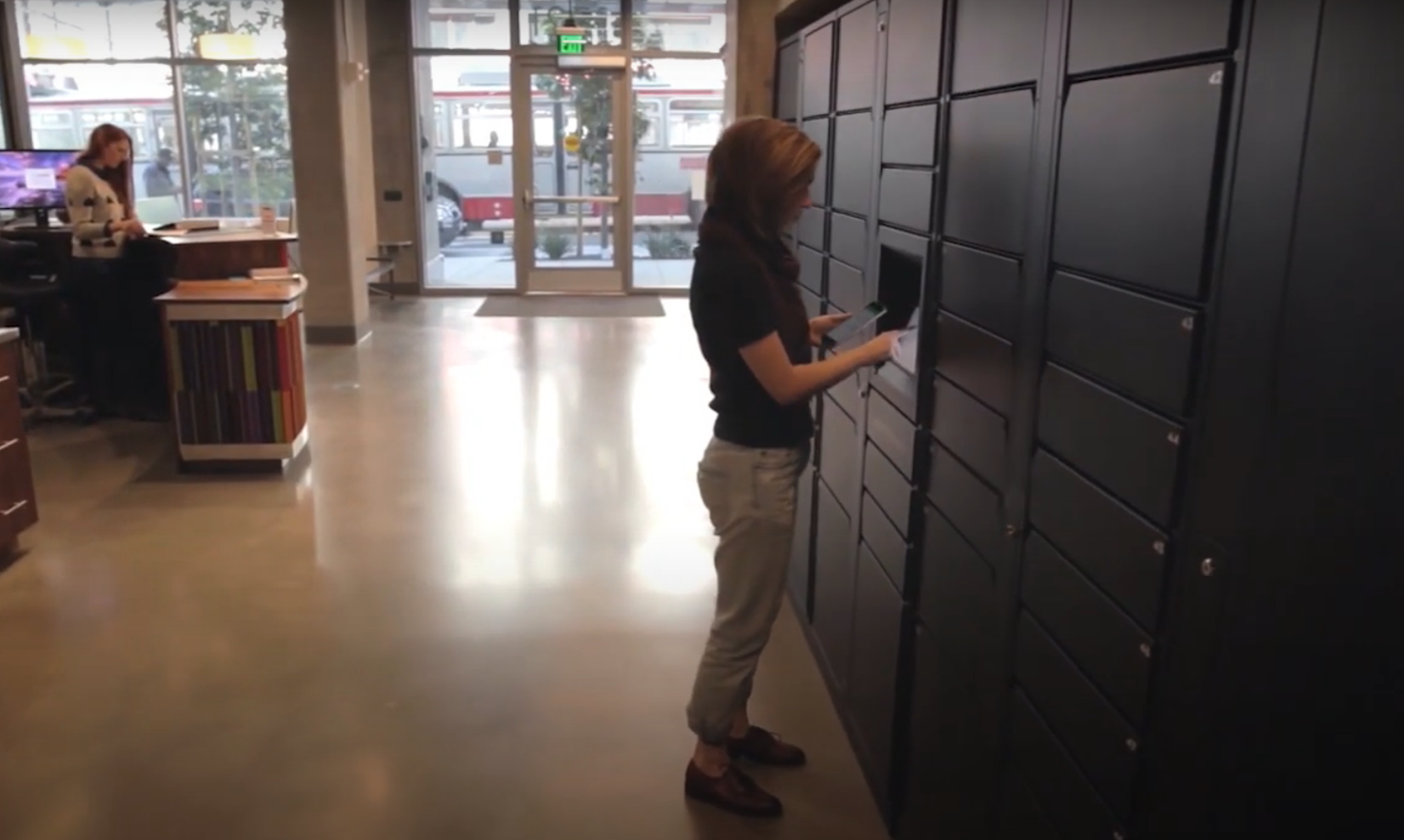 A lobby with a bank of Intelligent Lockers (Photo credit: Pitney Bowes)